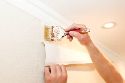 Pose de papier peint aux Bouchoux — revêtements muraux et toiles de verre